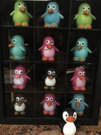 Colorful penguins for Cold Penguins First Friday specials.
