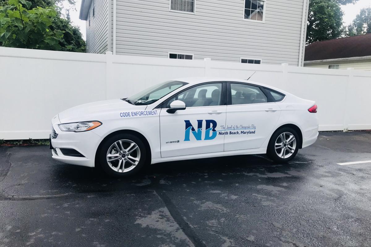 Hybrid, energy-efficient Ford Fusion to be used for town-related purposes.