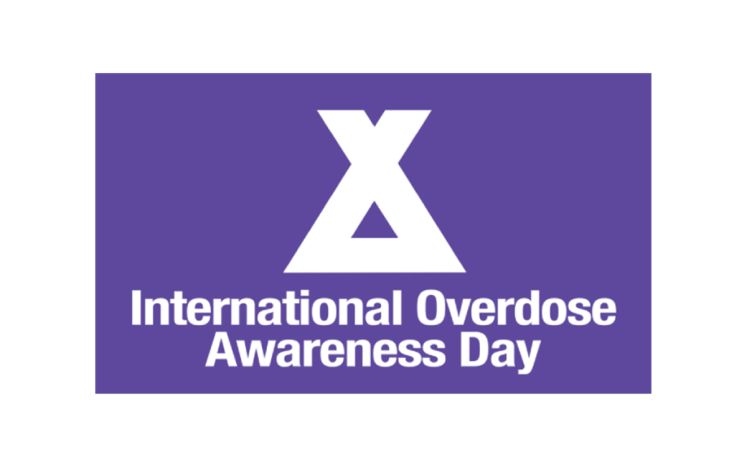 Purple and white logo for International Overdose Awareness Day.